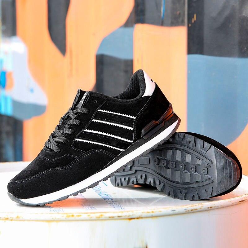 Black men's casual sneakers with white stripes, suede upper and rugged rubber outsole on Tampa Home & Garden Store