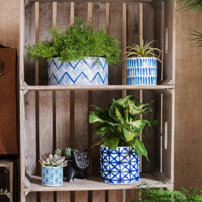 Blue Print ceramic vase planters 4-pack in blue/white geometric patterns on shelf RusticReach on Tampa Home & Garden Store