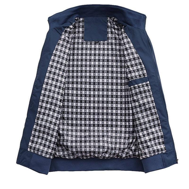 Men's blue lightweight windbreaker jacket by Stevvex with black-white checkered lining on Tampa Home & Garden Store