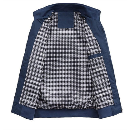 Men's blue lightweight windbreaker jacket by Stevvex with black-white checkered lining on Tampa Home & Garden Store