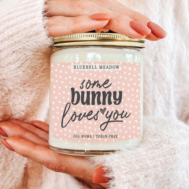 Bluebell Meadow Candle by Gia Roma, pink label with white polka dots on clear glass jar on Tampa Home & Garden Store