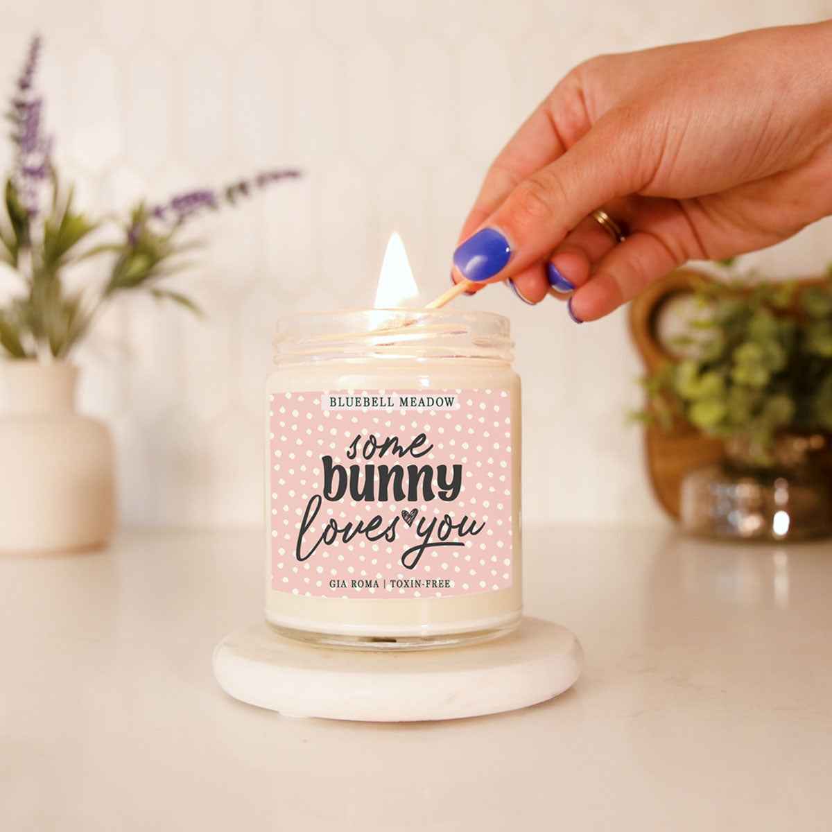 Bluebell Meadow Candle by Gia Roma, pink dotted label in glass jar on Tampa Home & Garden Store