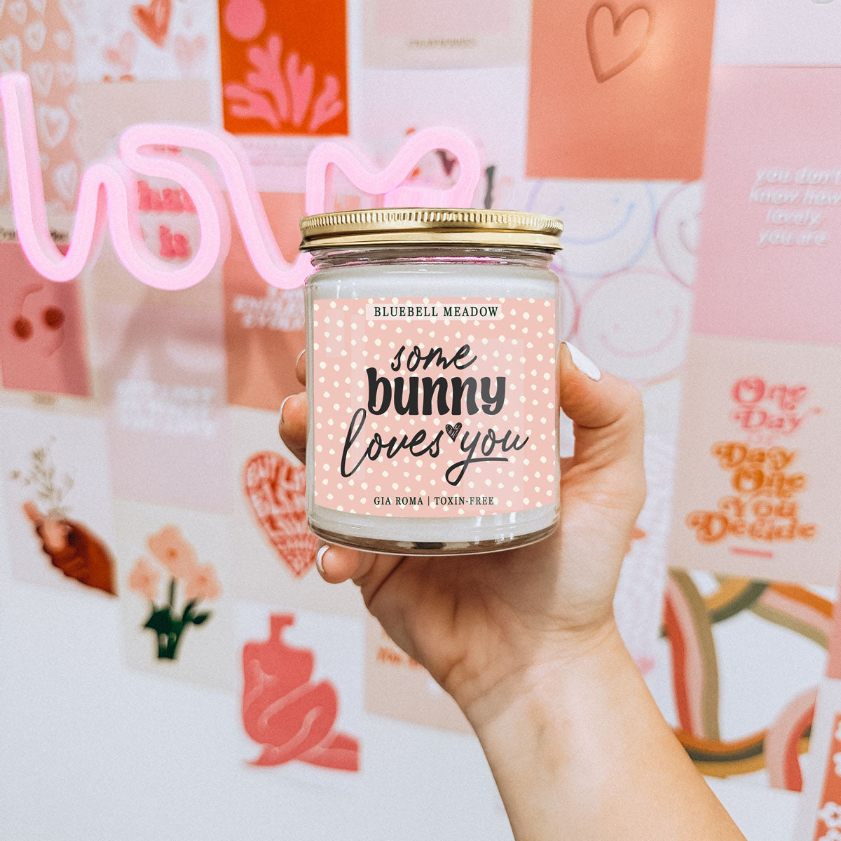 Bluebell Meadow Candle by Gia Roma in a clear glass jar with a pink dotted label on Tampa Home & Garden Store