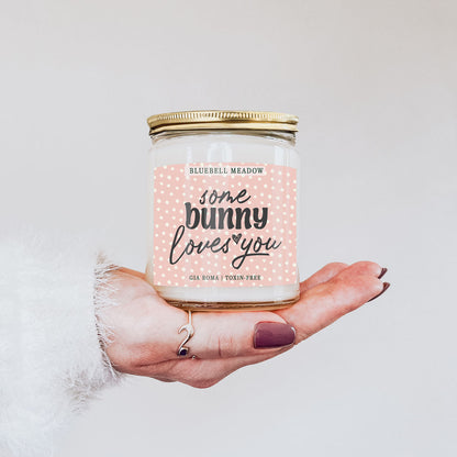 Bluebell Meadow Candle by Gia Roma, pink dotted label, clear glass jar with gold lid on Tampa Home & Garden Store