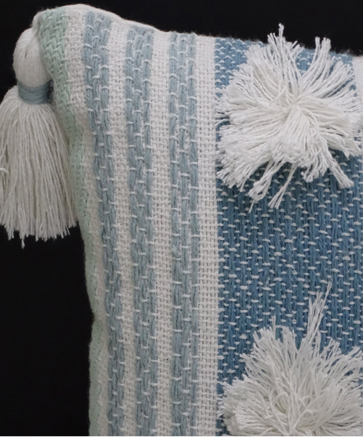 Vibhsa blue striped knit throw pillow 14x20 with large white tassels and poms on Tampa Home & Garden Store