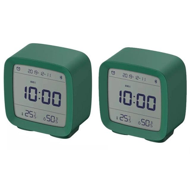 Two Stevvex green Bluetooth alarm clocks with LCD displays and dual alarms on Tampa Home & Garden Store