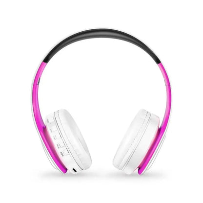 Stevvex Bluetooth foldable over-ear headphones with pink frame and white ear cushions on Tampa Home & Garden Store