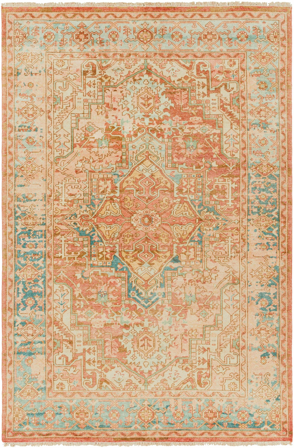 Bangonay area rug by Boutique Rugs in peach and aqua with an intricate oriental motif and fringe on Tampa Home & Garden Store