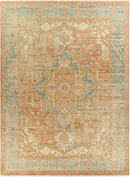 Bangonay area rug by Boutique Rugs in peach, blue, and cream with ornate oriental medallion center and border on Tampa Home & Garden Store