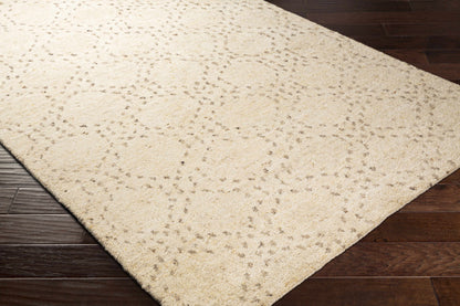 Banksia Area Rug, cream shag with subtle gray speckled pattern on dark wood floor on Tampa Home & Garden Store