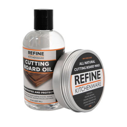 Refine Kitchenware cutting board oil bottle with black cap beside a wax tin, 2-item set on Tampa Home & Garden Store