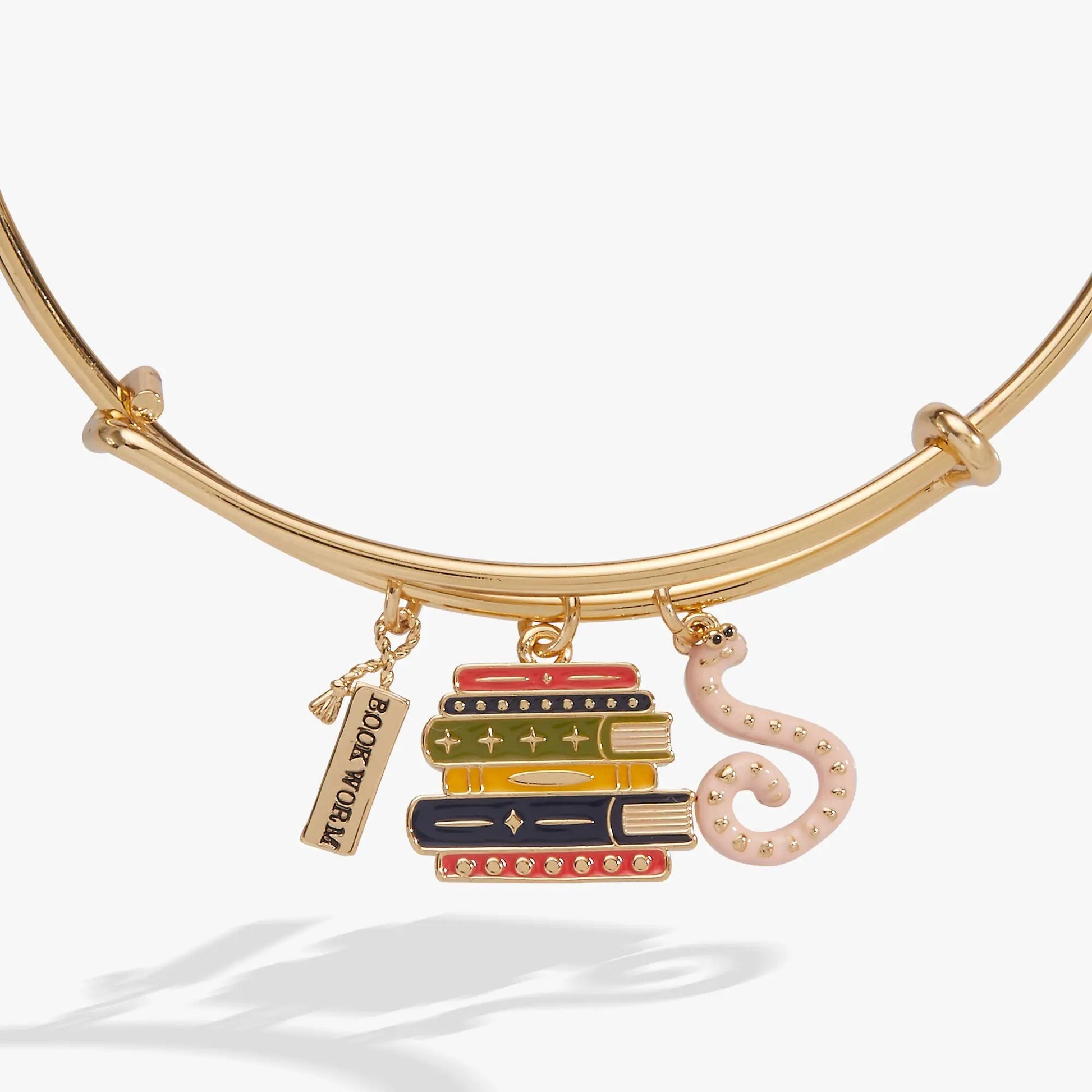Book Club Multicharm Bangle gold-tone with enamel book charms and pink snake charm, Alex and Ani on Tampa Home & Garden Store
