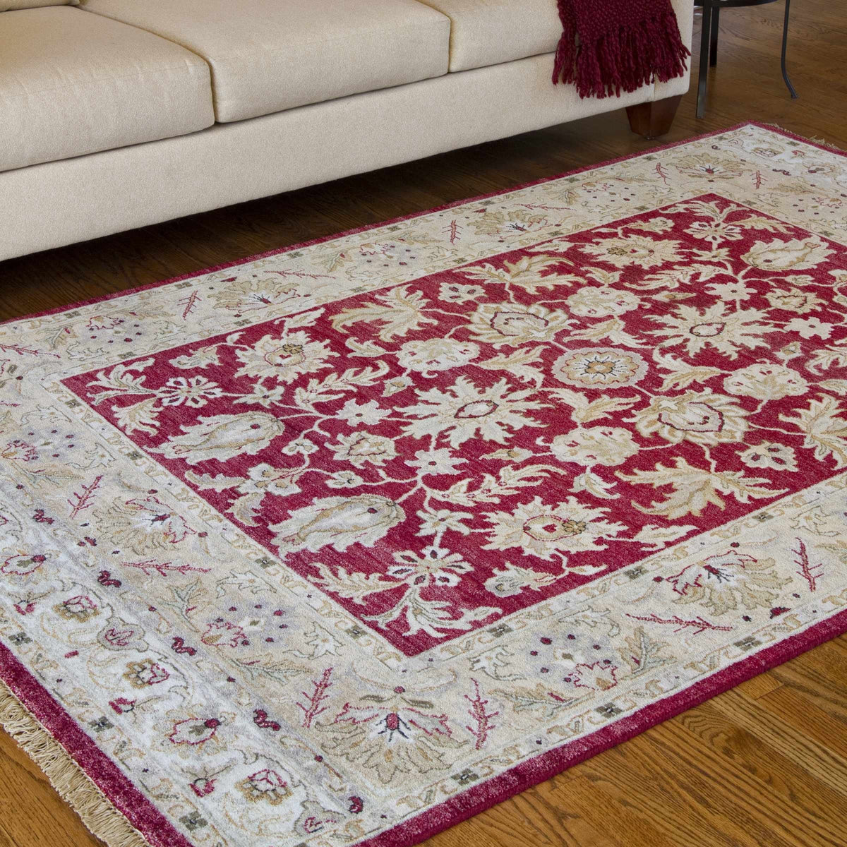 Red & Gold Premium Wool Area Rug with beige field, red ornate border and fringe edges on Tampa Home & Garden Store