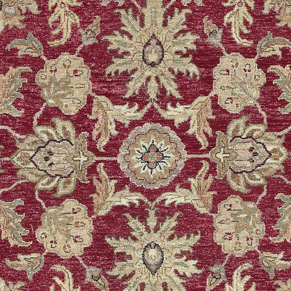 Red and gold premium wool area rug by Boutique Rugs with ornate floral medallion pattern on Tampa Home & Garden Store