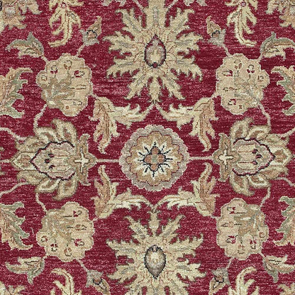 Red and gold premium wool area rug by Boutique Rugs with ornate floral medallion pattern on Tampa Home & Garden Store