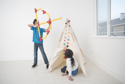TubeLox Deluxe STEM toy set: yellow tubes with red connectors form a frame; 3 sets and bags on Tampa Home & Garden Store