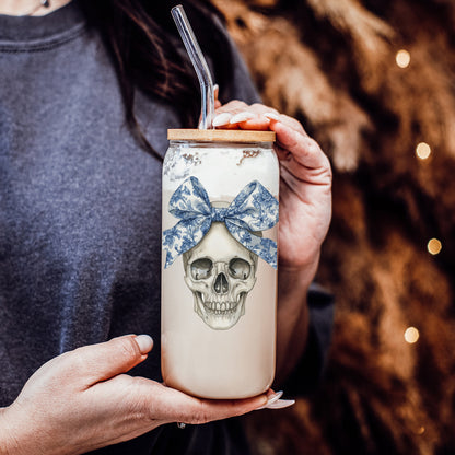 Gia Roma Bow Skull 20oz travel mug with beige body, blue patterned skull bow and clear straw on Tampa Home & Garden Store