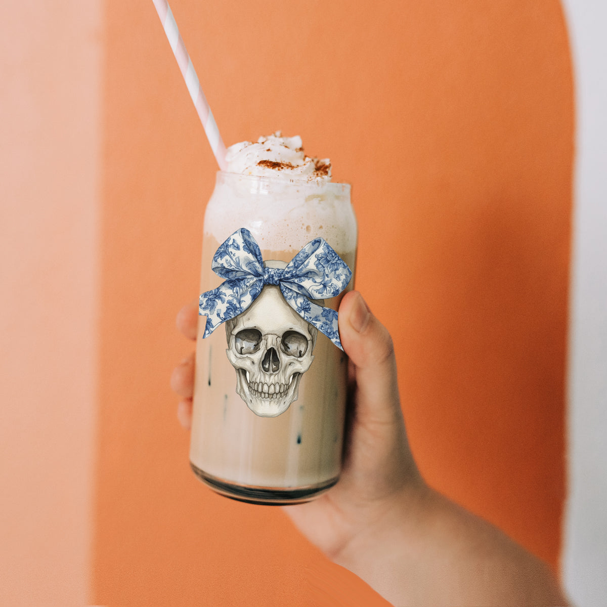 Bow Skull 20oz travel mug Gia Roma with blue bow skull graphic on striped straw on Tampa Home & Garden Store