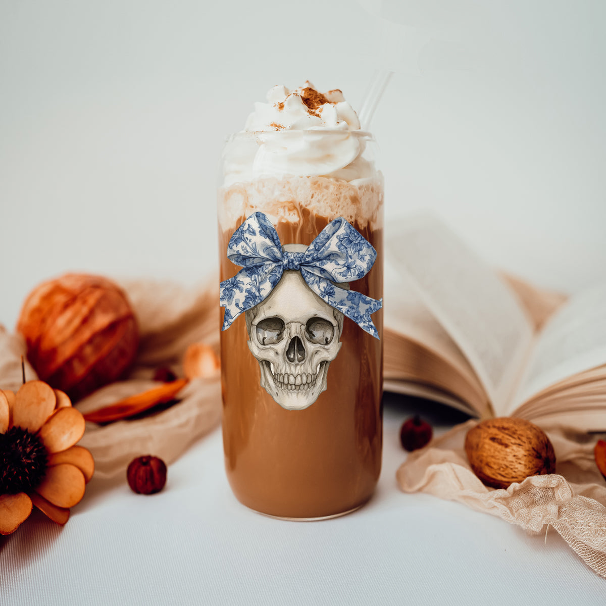 Bow Skull 20oz travel mug by Gia Roma with blue floral bow skull graphic and whipped cream on Tampa Home & Garden Store