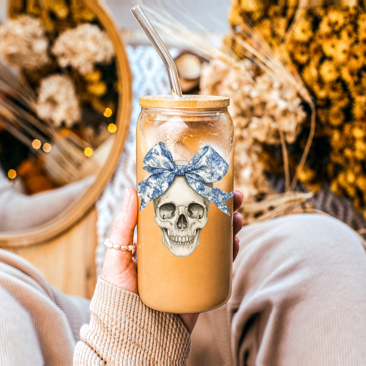 Bow Skull 20oz travel mug by Gia Roma with skull graphic and blue floral bow on Tampa Home & Garden Store