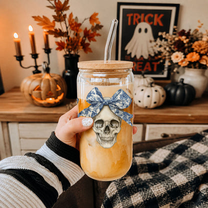 Bow Skull 20oz travel mug with blue bow skull, amber gradient, bamboo lid and clear straw on Tampa Home & Garden Store