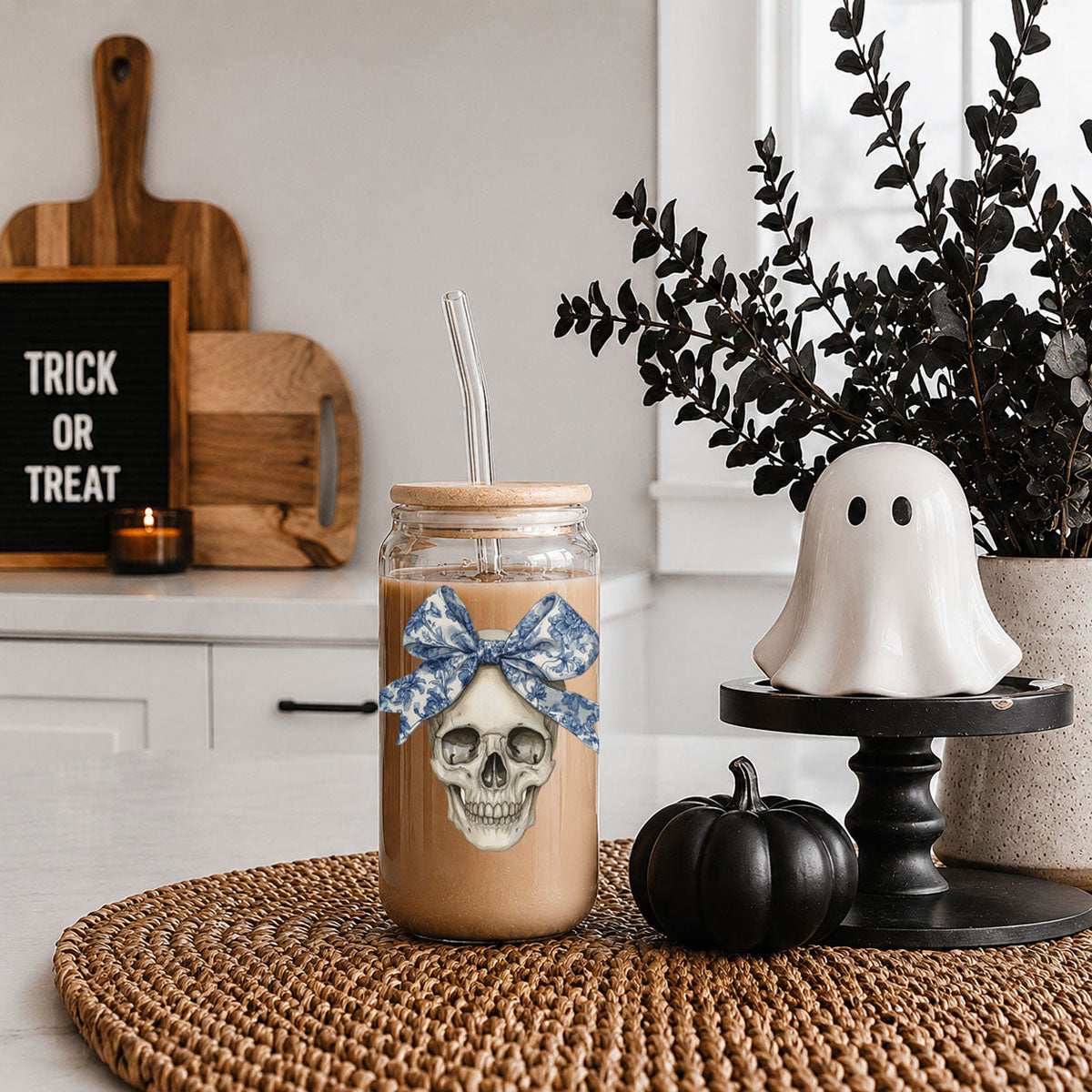 Bow Skull 20oz travel mug with skull graphic and blue bow, cork lid, clear straw on Tampa Home & Garden Store