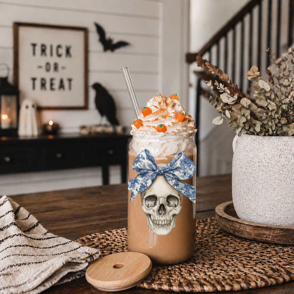 Bow Skull 20oz travel mug with blue bow skull graphic, whipped cream, straw, sprinkles on Tampa Home & Garden Store