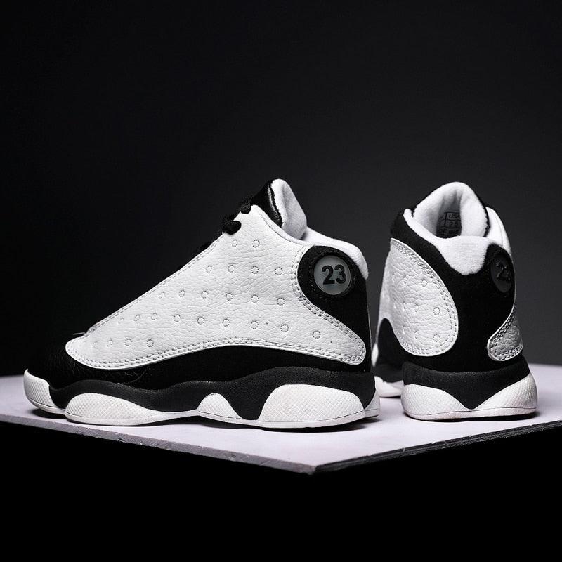 Stevvex white perforated basketball shoes pair with black accents, 23 badge, non-slip outsole on Tampa Home & Garden Store