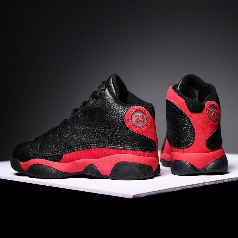 Stevvex boys basketball shoes ST85SH4711RRY, black with red accents, non-slip sole pair on Tampa Home & Garden Store