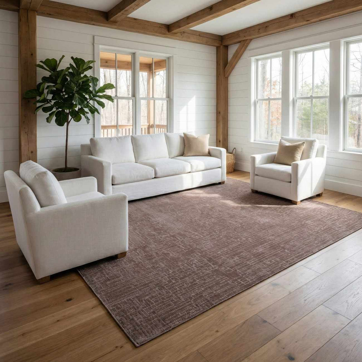 Leanna light brown washable area rug with subtle texture in a bright living room on Tampa Home & Garden Store