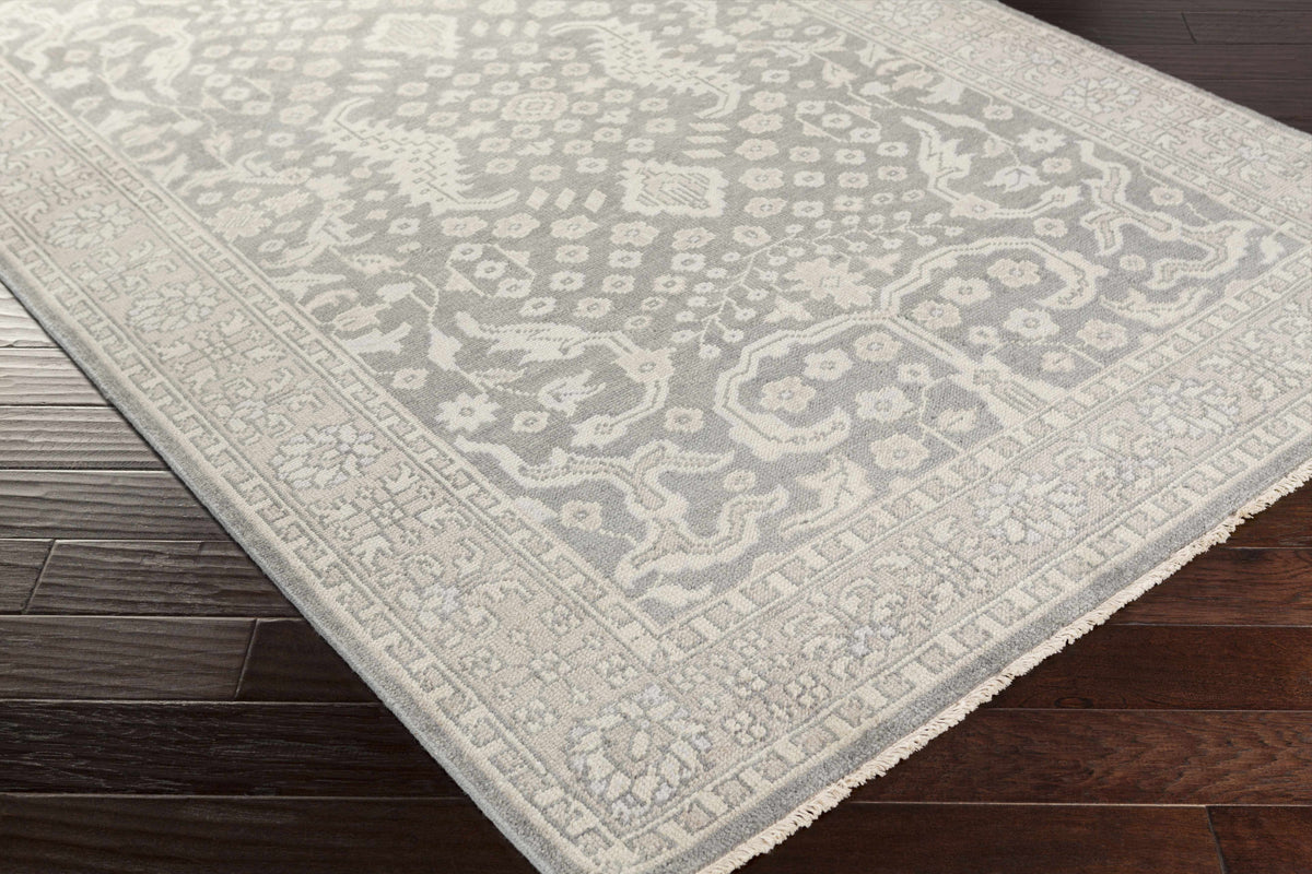 Bradfordsville Rug by Boutique Rugs, gray ivory oriental rug with floral border on floor on Tampa Home & Garden Store
