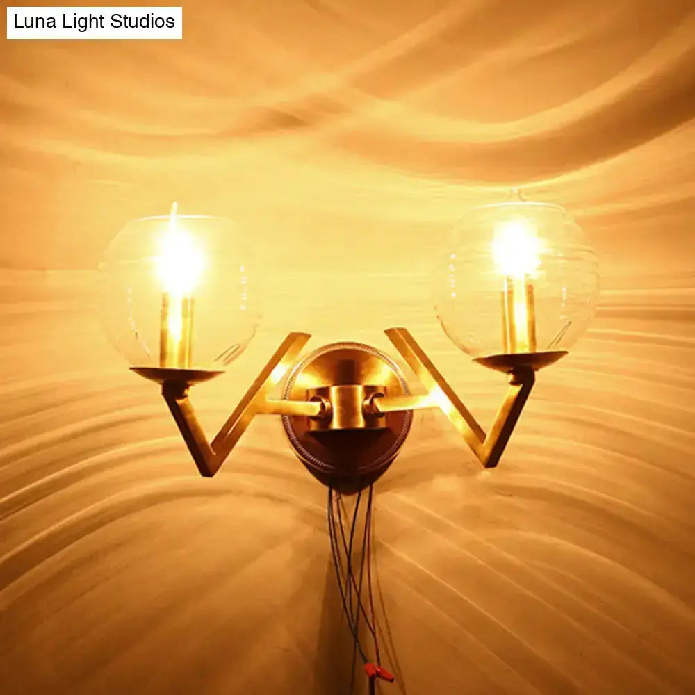 Brass ball sconce with ribbed glass shades and two bulbs, wall mount lighting by Decorbites on Tampa Home & Garden Store