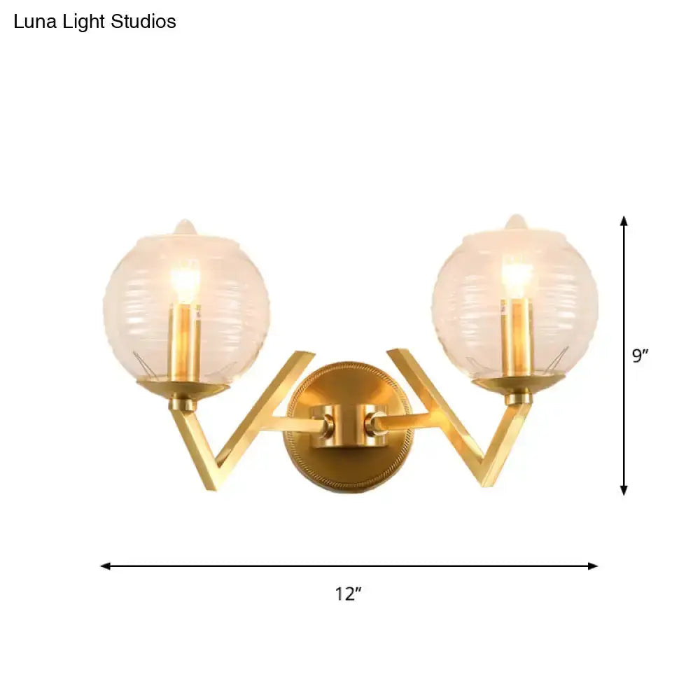 Brass ball sconce with ribbed glass shades, dual-arm gold wall light by Decorbites on Tampa Home & Garden Store