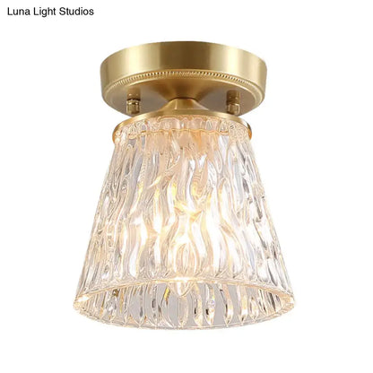 Brass Glass Flush Mount Light with textured clear glass shade and brass finish on Tampa Home & Garden Store