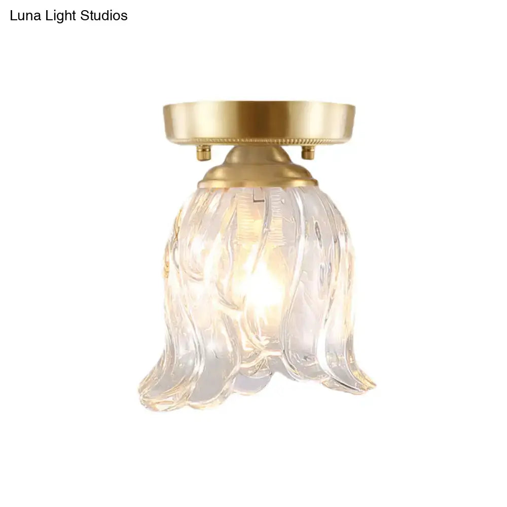 Brass Glass Flush Mount Light by Decorbites with a ribbed clear glass shade on Tampa Home & Garden Store