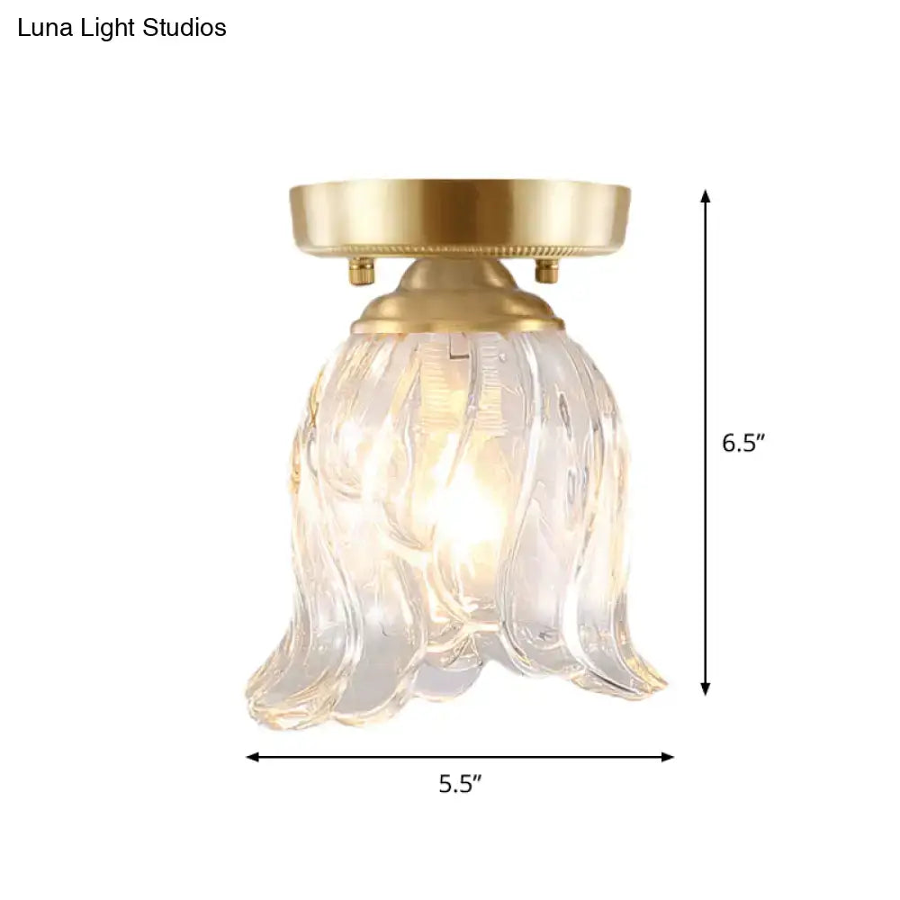 Brass Glass Flush Mount Light with clear scalloped petal shade by Decorbites on Tampa Home & Garden Store