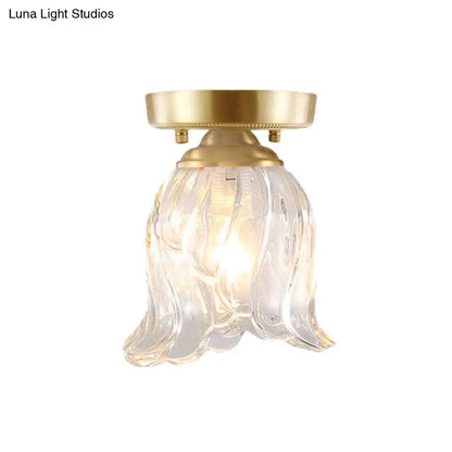 Brass Glass Flush Mount Light with clear petal-shaped glass shade by Decorbites on Tampa Home & Garden Store