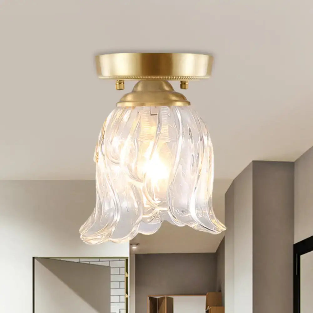 Brass Glass Flush Mount Light with clear flower-shaped glass shade by Decorbites on Tampa Home & Garden Store