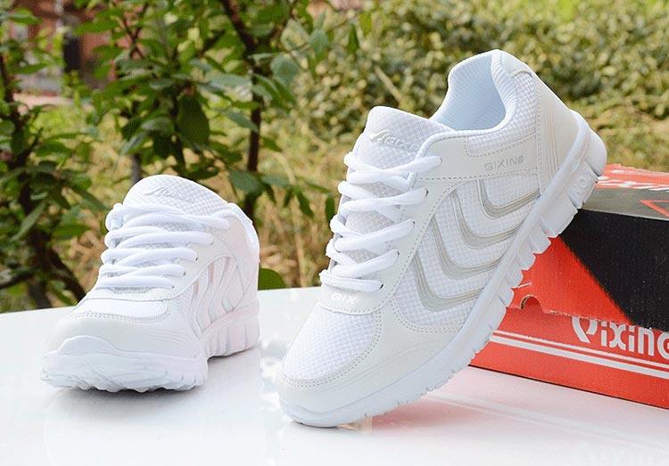 Stevvex white women's sneakers with breathable mesh upper, lace-up casual shoes; two on Tampa Home & Garden Store