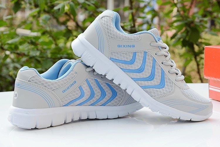 Breathable Stevvex sneakers with QIXING logo, white mesh pair lace-up casual athletic on Tampa Home & Garden Store
