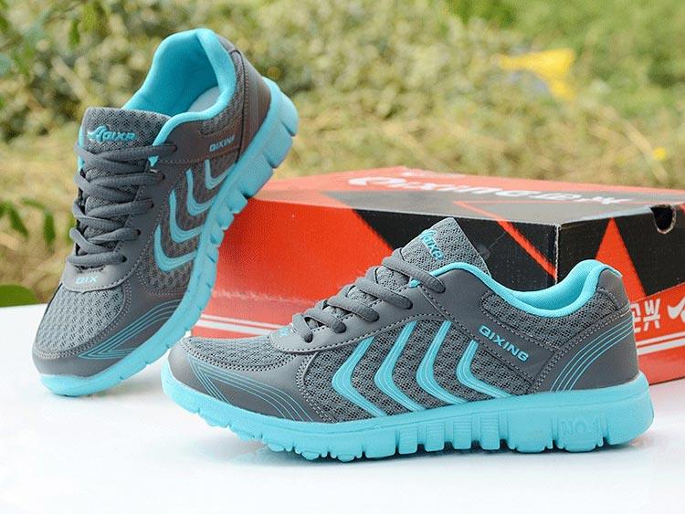 Stevvex breathable women's sneakers grey mesh with teal accents lace-up road running shoes pair on Tampa Home & Garden Store