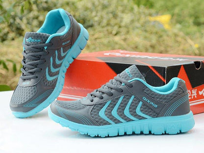 Stevvex breathable women's sneakers grey mesh with teal accents lace-up road running shoes pair on Tampa Home & Garden Store