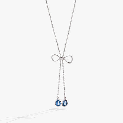 Bow Adjustable Slider Necklace with silver-tone chain and two blue teardrop gems on Tampa Home & Garden Store