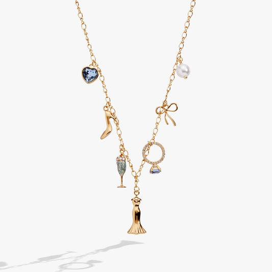 Bridal multi-charm necklace in gold with blue heart gemstone, pearl charm, champagne flute, bow on Tampa Home & Garden Store