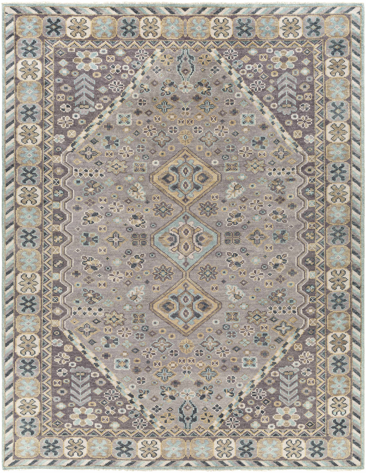 Boroon Area Rug by Boutique Rugs in mauve-gray with teal border and subtle medallions on Tampa Home & Garden Store