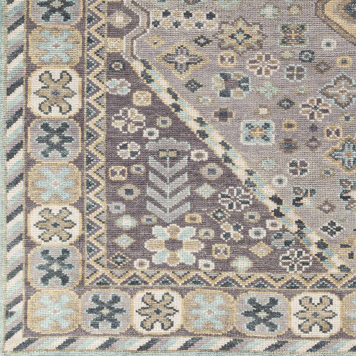 Boroon Area Rug by Boutique Rugs in brown, ivory, teal geometric pattern on Tampa Home & Garden Store
