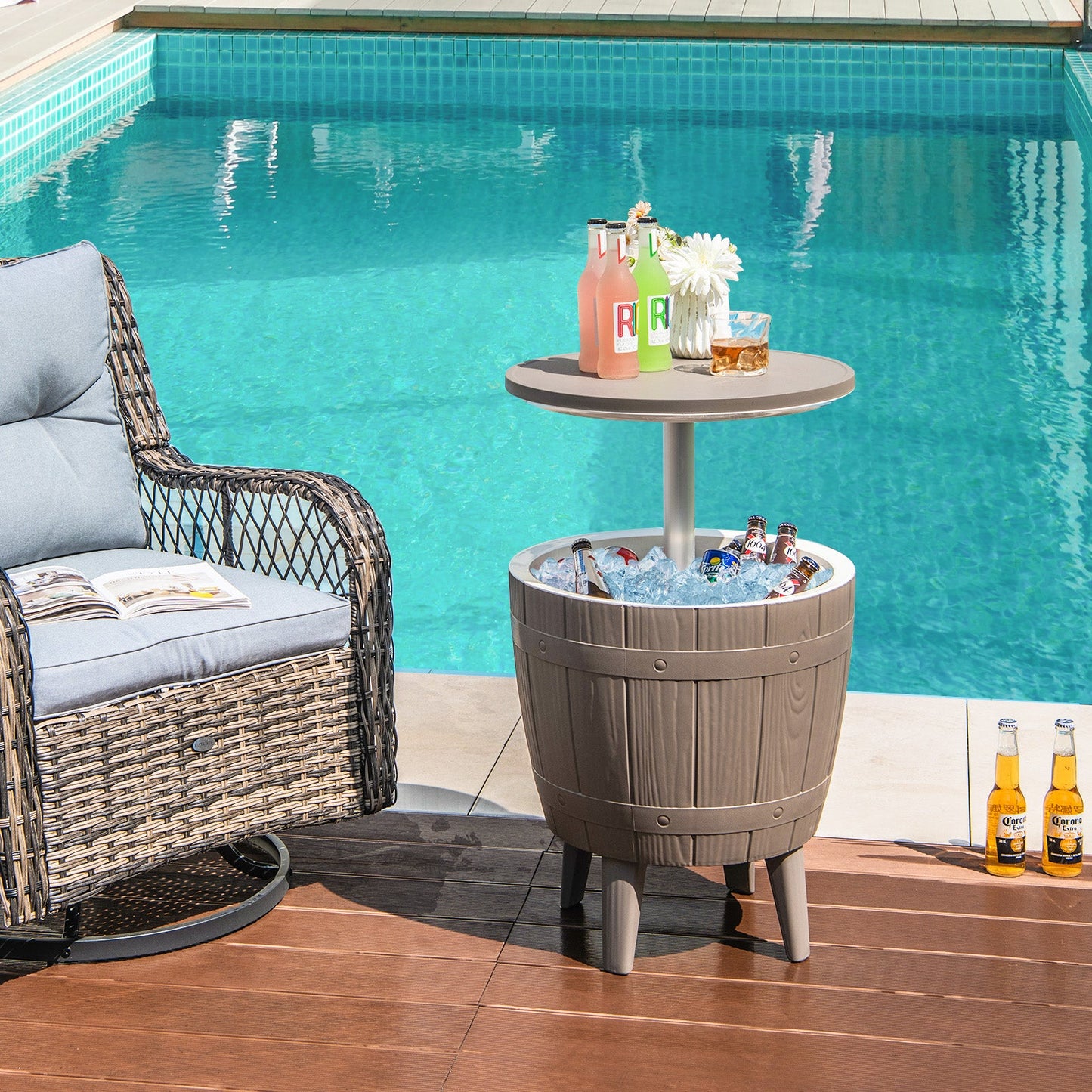 10 Gallon Cooler Bar Table with telescoping top beside pool; bottles on ice-filled barrel on Tampa Home & Garden Store