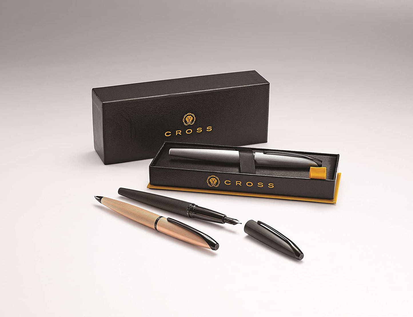 Cross ATX brushed rose gold ballpoint pen with black clip; three-pen Cross set in box on Tampa Home & Garden Store