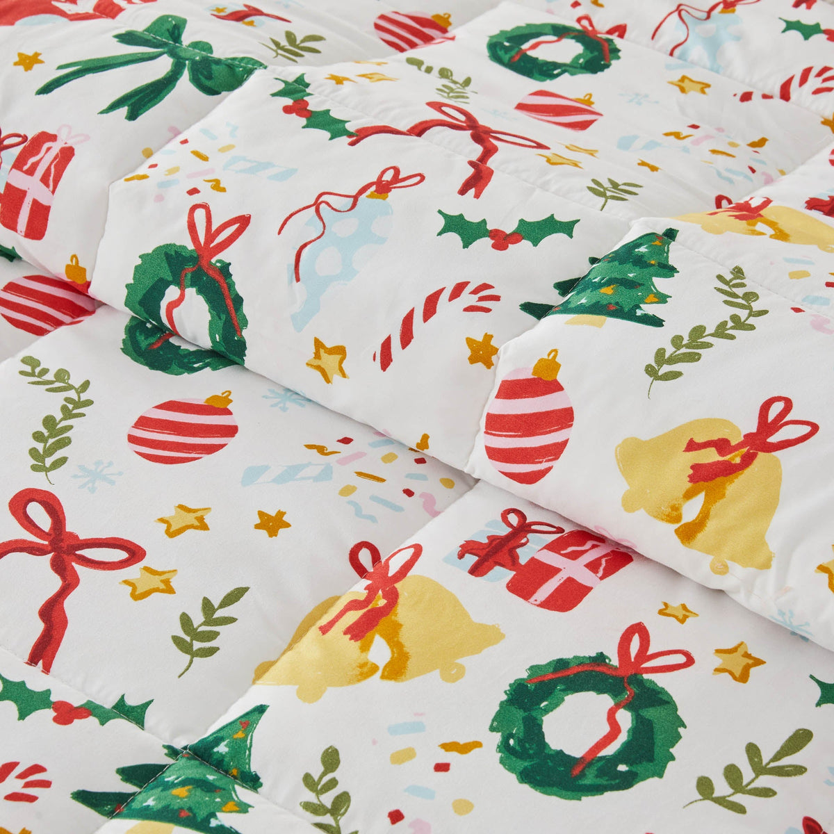 Reversible Christmas Comforter & Sham Set by Great Bay Home white quilt with red bows and holly on Tampa Home & Garden Store