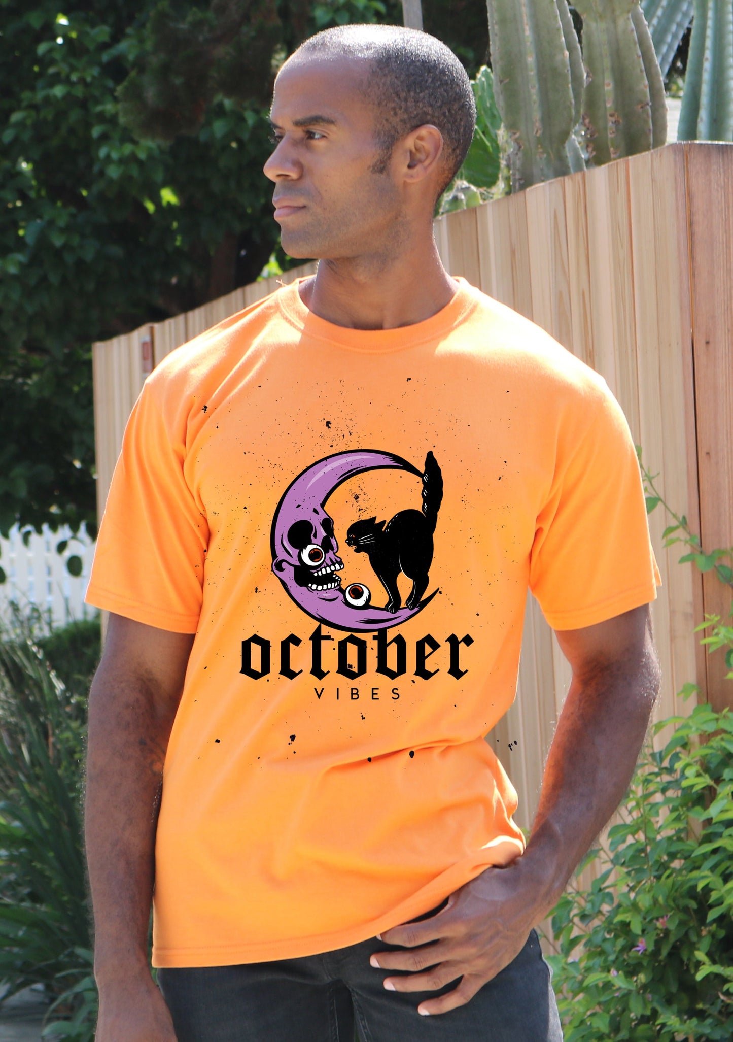 men's orange graphic tee with moon and cat design, October Vibes print, short sleeves on Tampa Home & Garden Store